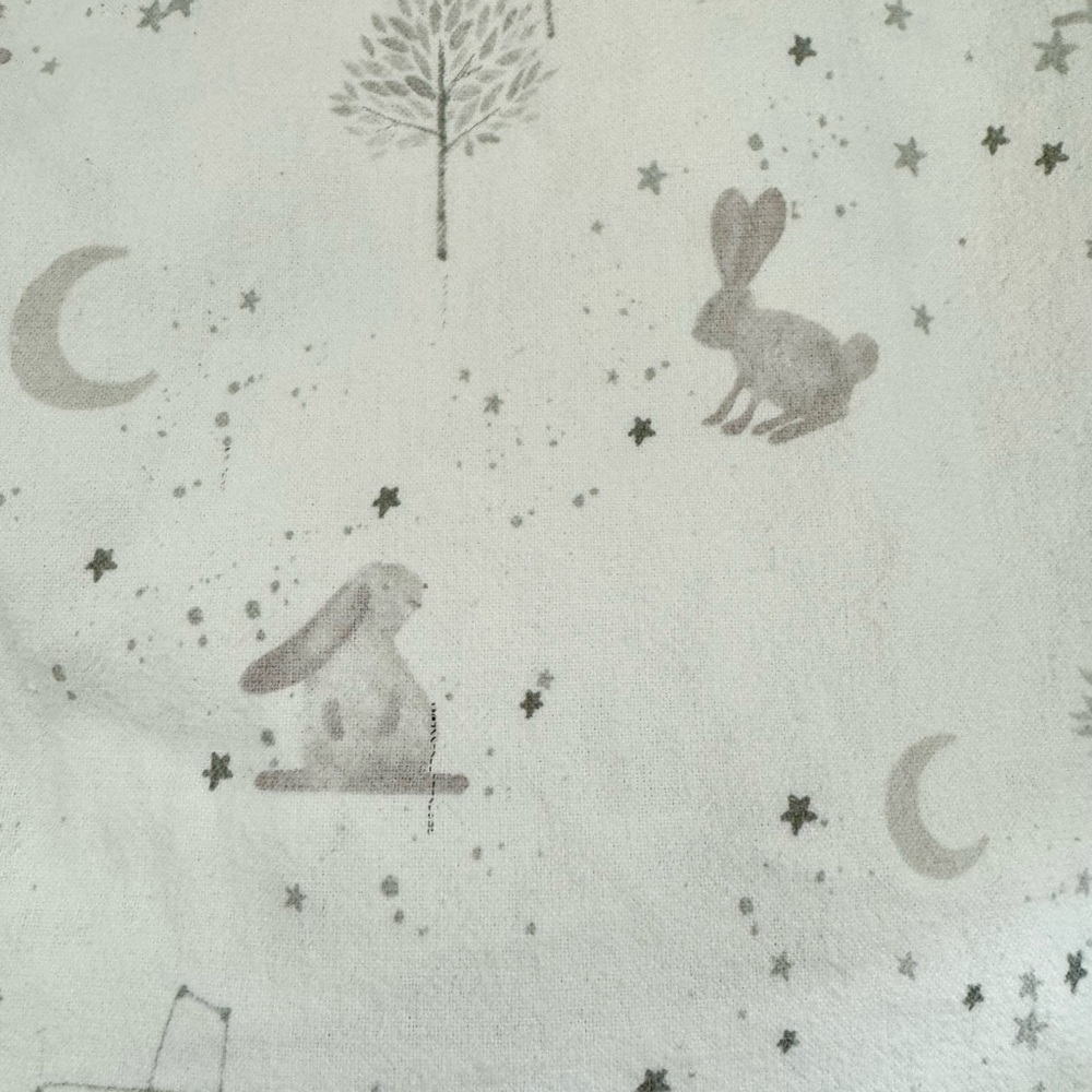 Three flannel Pottery Barn Kids crib sheets